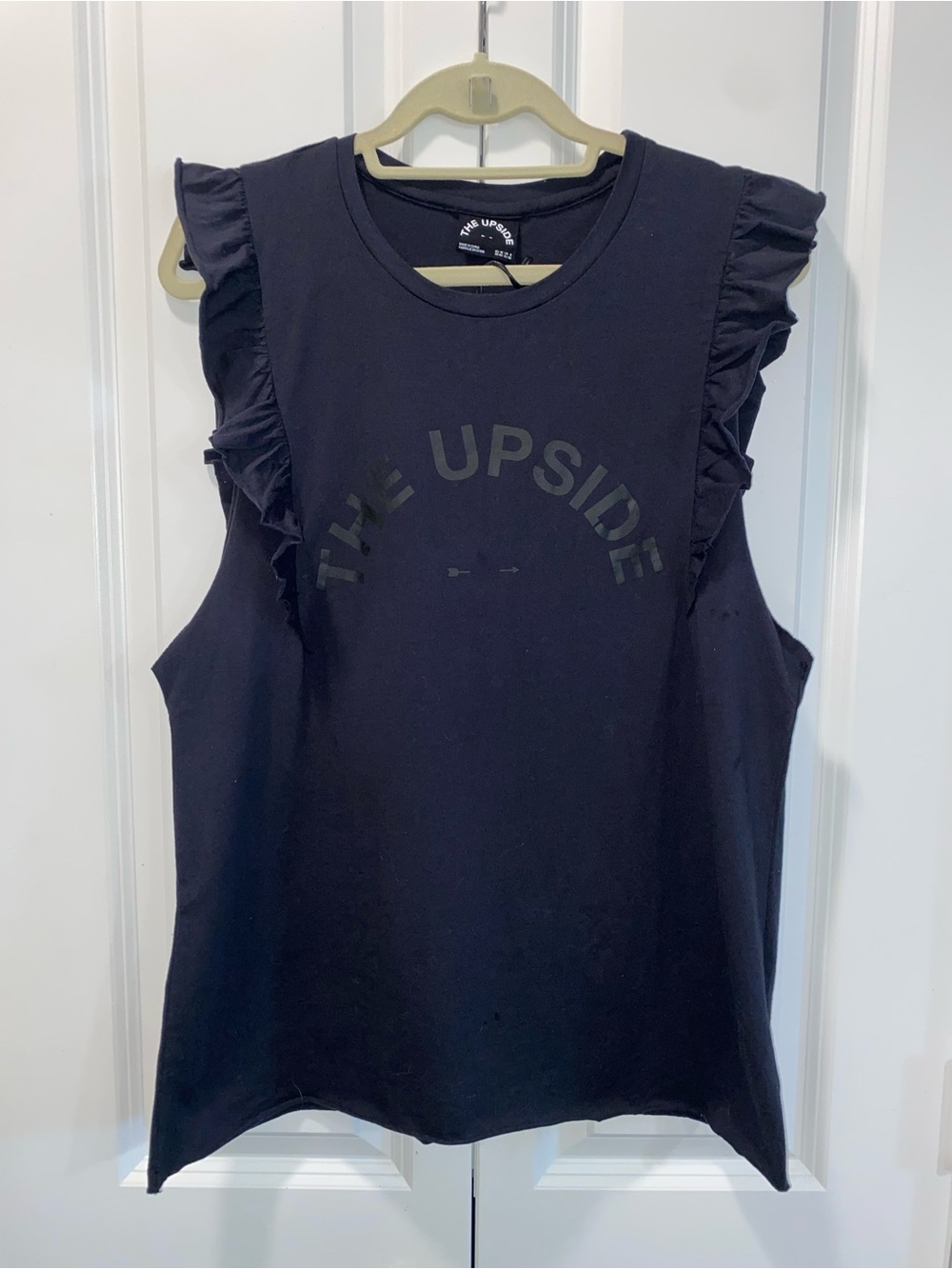 The Upside Black Ruffle Muscle Tank with Logo